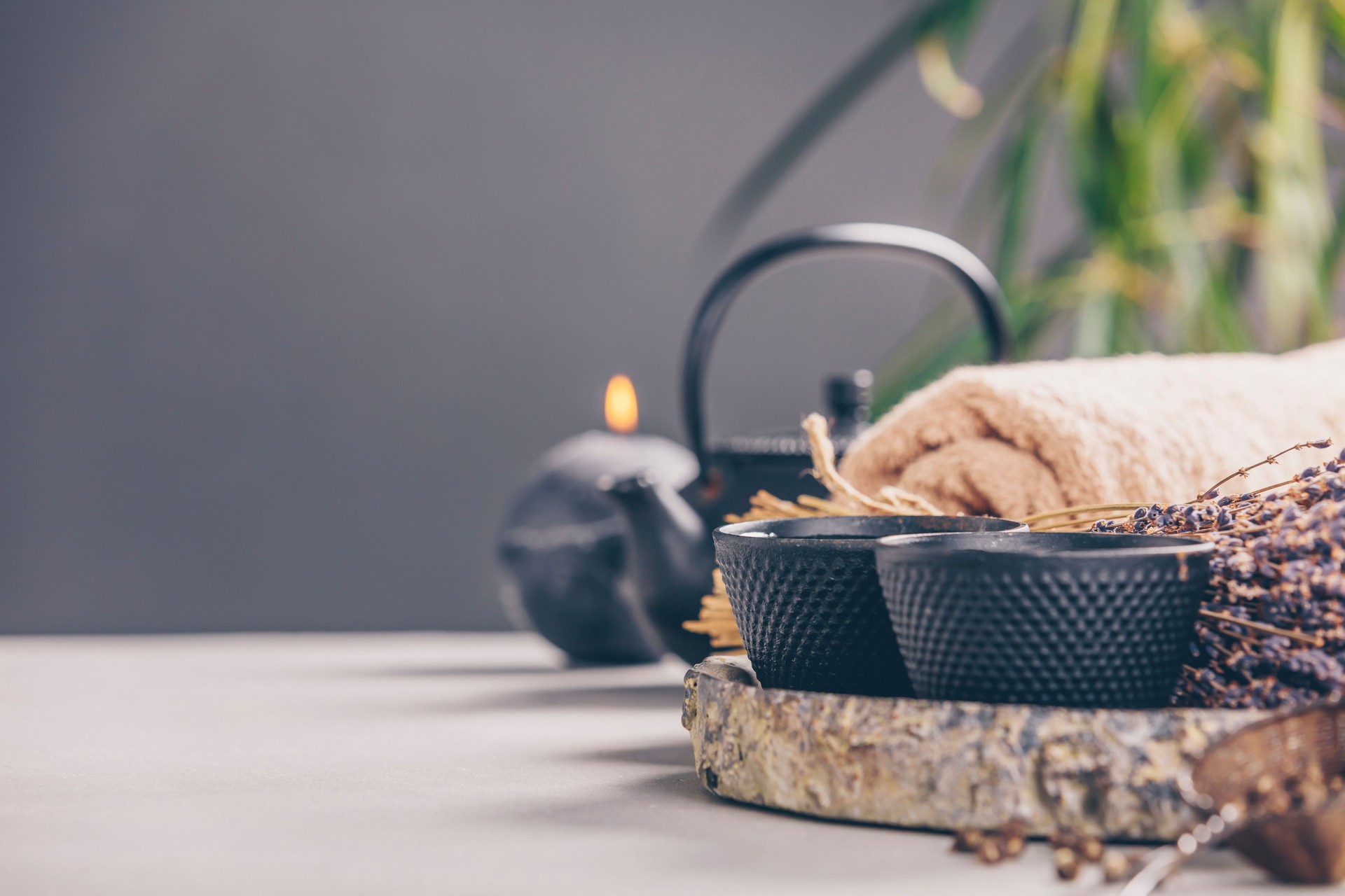 Tea and SPA composition on concrete background - space for text Tea and SPA composition on concrete background - space for text